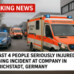 Ambulance and police vehicles outside the company office in Mellrichstadt, Germany